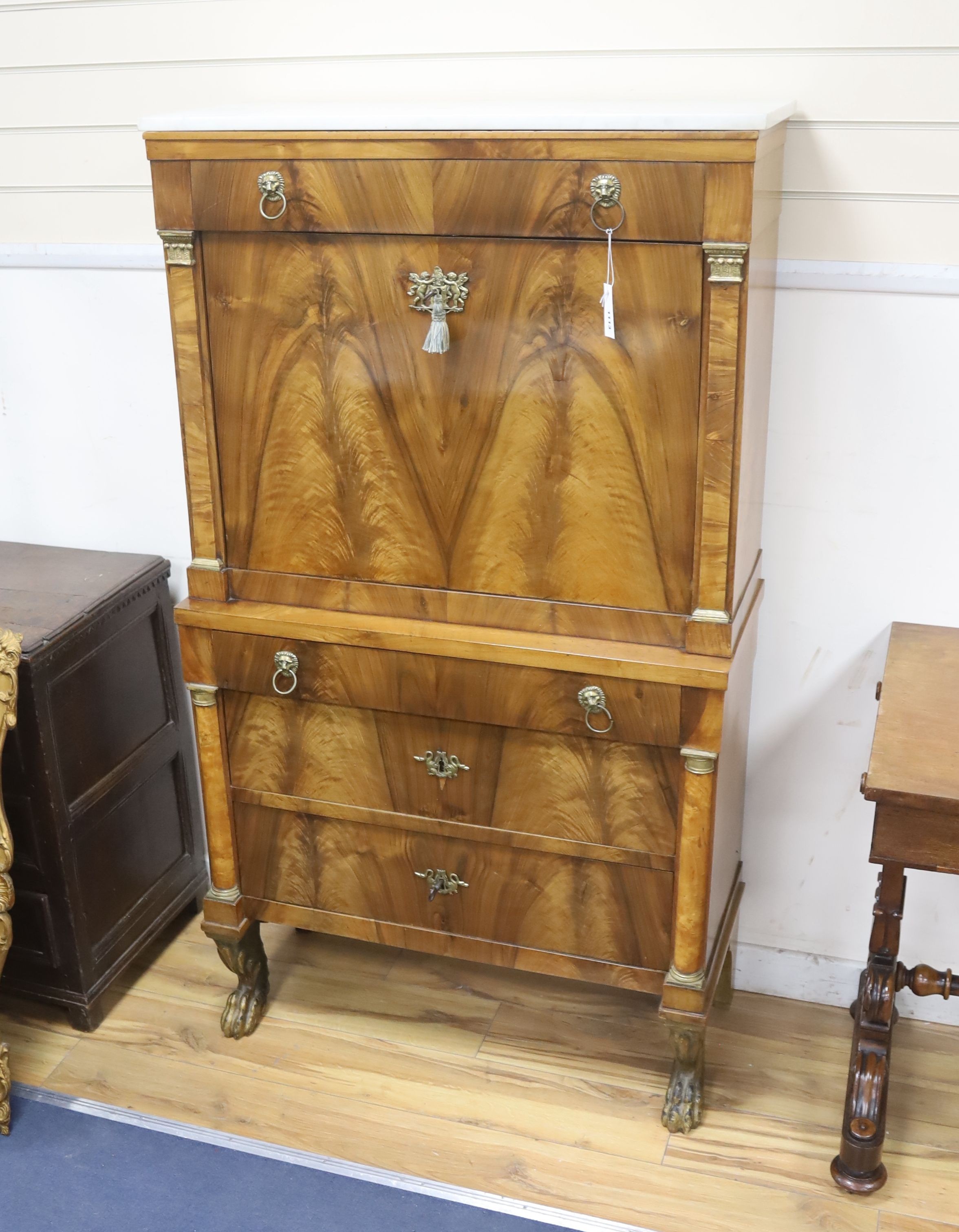 A 19th century French Empire flame mahogany escritoire, width 88cm, depth 37cm, height 155cm